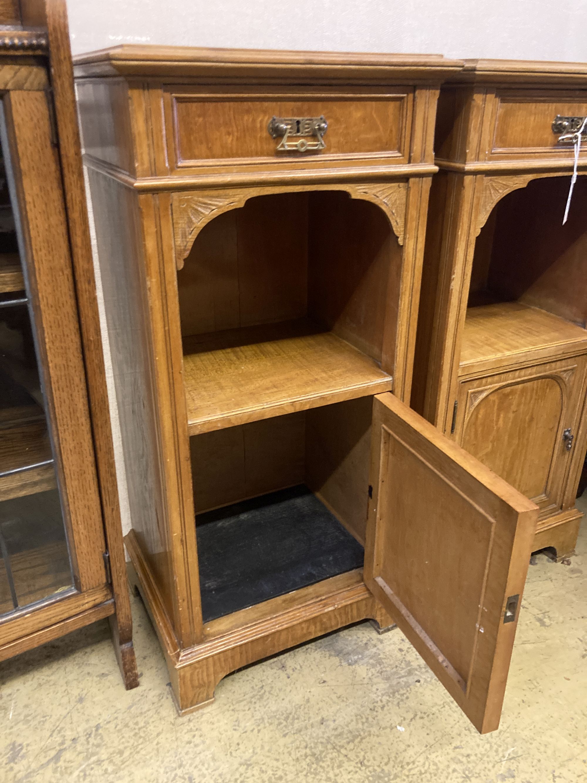 A pair of early 20th century satin walnut bedside cabinets, width 42cm, depth 34cm, height 91cm